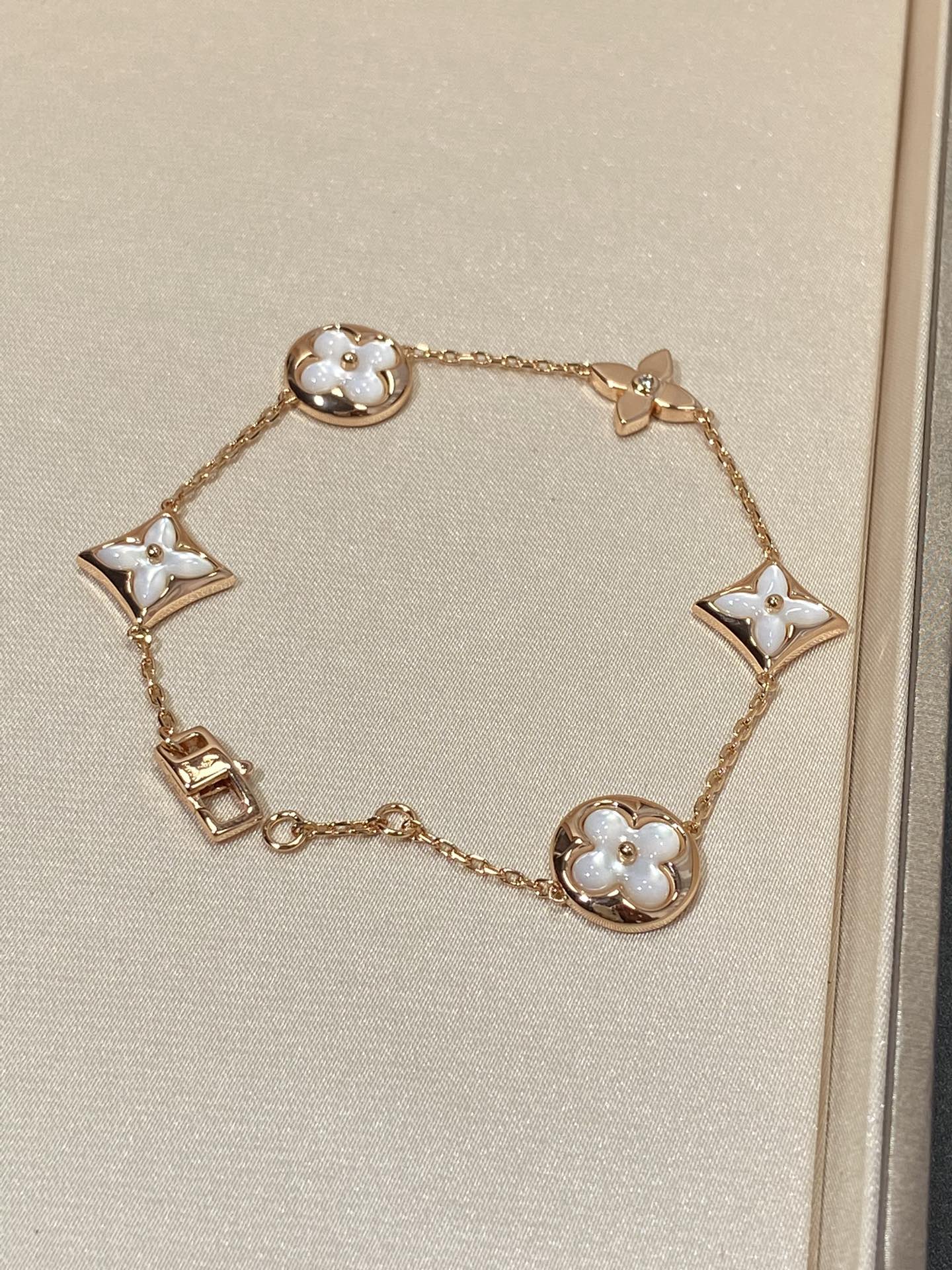 [Dawnora Jewelry]STAR AND SUN 5 MOTIF MOP PINK GOLD BRACELET