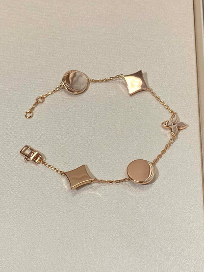 [Dawnora Jewelry]STAR AND SUN 5 MOTIF MOP PINK GOLD BRACELET